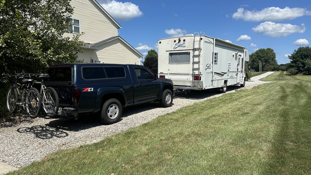 2008 Chevrolet Colorado hitched behind a Shasta motorhome
